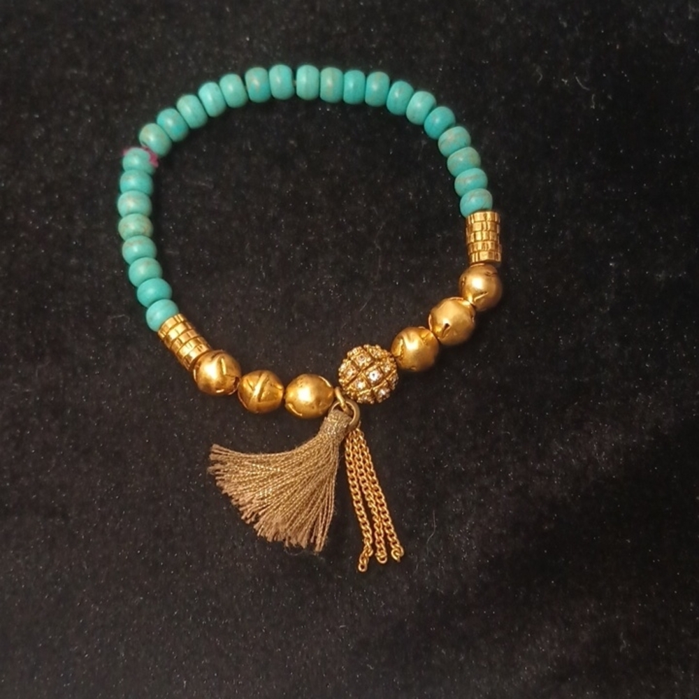 Reconstituted turquoise and brass Beads Bracelet with gold colored Tassel